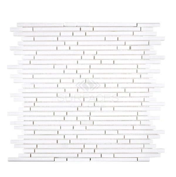 The Thassos White (Greek) Bamboo Sticks Mosaic Marble Polished-Honed from SurfacesGalore features a white, rectangular pattern of varying lengths and widths arranged in horizontal rows, showcasing the elegance of Thassos White Marble.