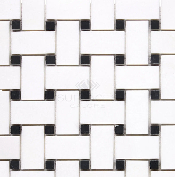 The Thassos White (Greek) Basketweave Mosaic (w/ Black) Marble Polished-Honed tiles from SurfacesGalore offer versatile applications and add a touch of luxury to any space with their interlocking basket weave pattern featuring small black square accents.