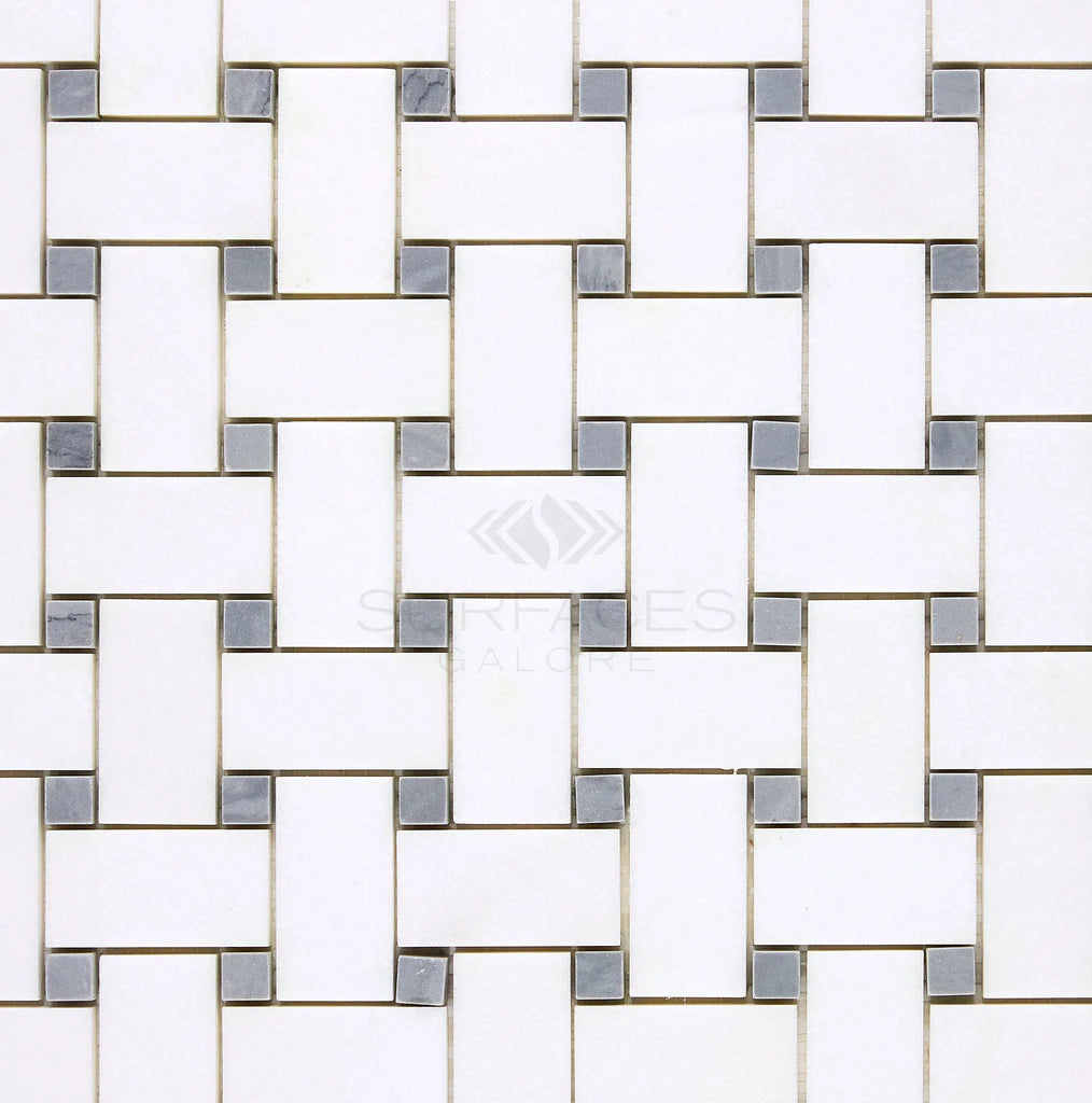 The Thassos White (Greek) Basketweave Mosaic (w/ Blue-Gray) Mosaic Marble Polished-Honed tiles by SurfacesGalore evoke the elegance of Greek marble with their white geometric design interspersed with small blue-gray square tiles.