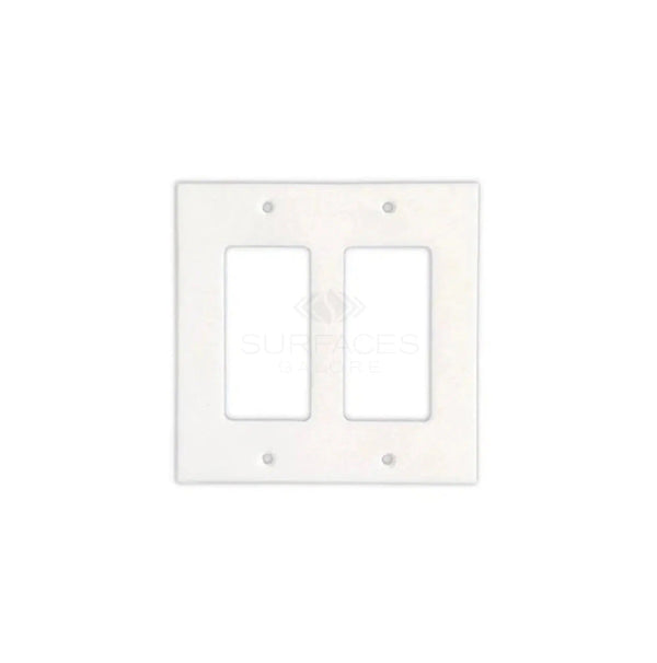 The Thassos White Marble Double ROCKER Switch Wall Plate from SurfacesGalore is a two-gang wall plate with openings for two rocker switches. It includes screws and features a white, marble design that adds a touch of natural stone decor to your home.