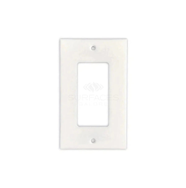 The Thassos White Marble Single ROCKER Plate Switch Wall Plate from SurfacesGalore features an elegant design that mimics the look of authentic marble, adding a subtle yet sophisticated touch to your décor. It has two screw holes and is displayed on a plain white background.