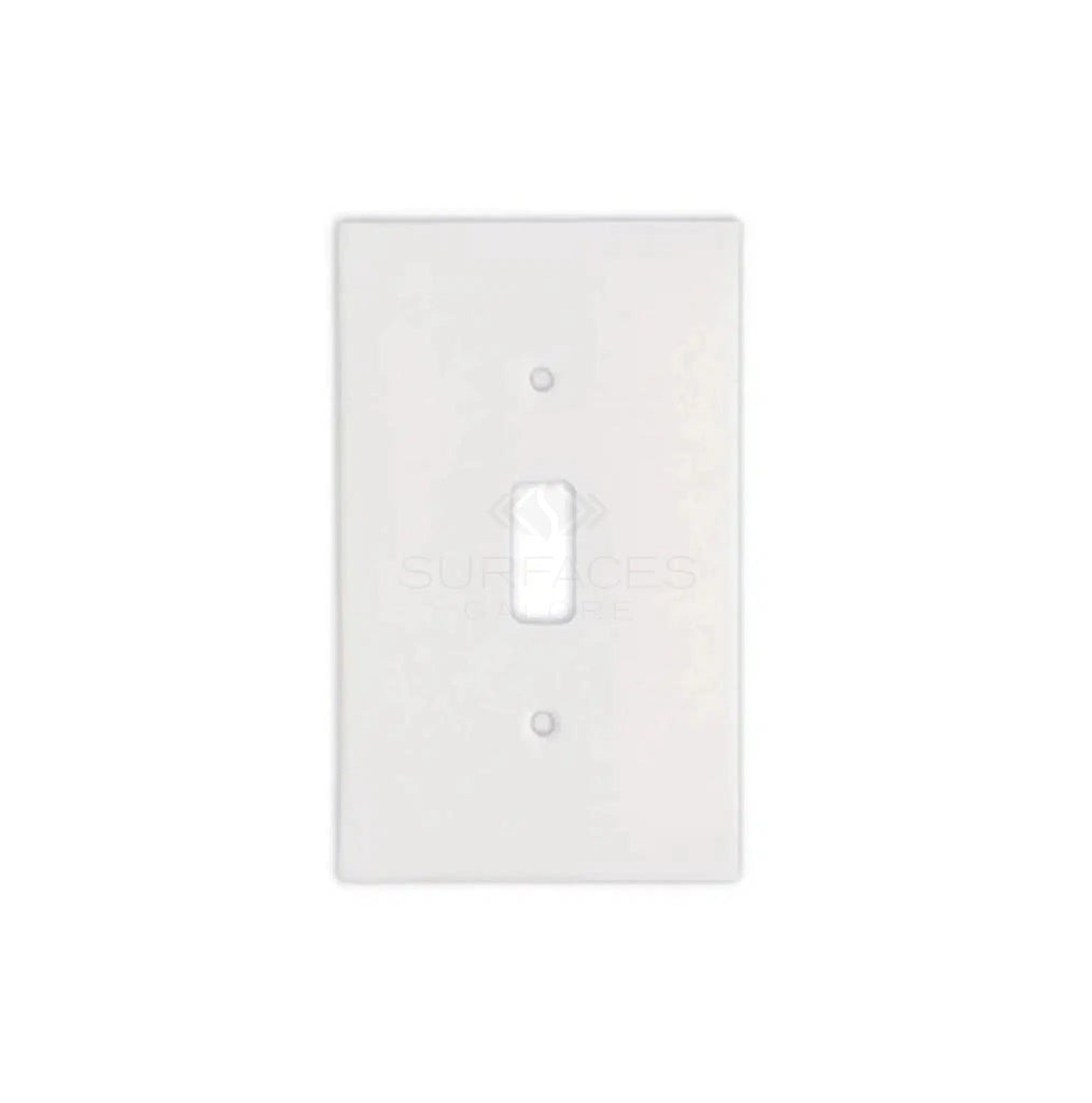 The Thassos White Marble Single TOGGLE Plate Switch Wall Plate/Cover Plate/Switch Plate by SurfacesGalore is a luxurious, rectangular white switch plate cover featuring a single opening for a switch, set against a pristine white background.