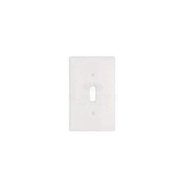 A Thassos White Marble Single TOGGLE Plate Switch Wall Plate by SurfacesGalore, crafted to emulate authentic marble with a central toggle switch opening, set against a white background.