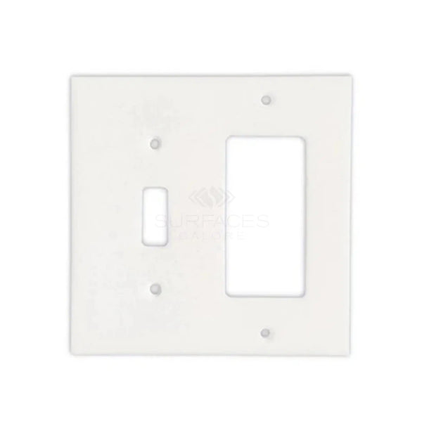 The SurfacesGalore Thassos White Marble TOGGLE - ROCKER Switch Wall Plate/Cover Plate/Switch Plate features one toggle switch opening and one rectangular outlet opening, designed to mimic an authentic marble wall plate, perfect for luxury home decor.