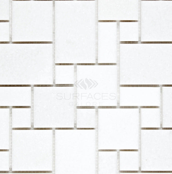 The Thassos White (Greek) Mini-Versailles Pattern Mosaic Marble Polished-Honed tiles from SurfacesGalore feature a polished, honed finish and white rectangular tiles arranged in a geometric pattern with varying sizes and gaps, perfect for achieving an elegant look.