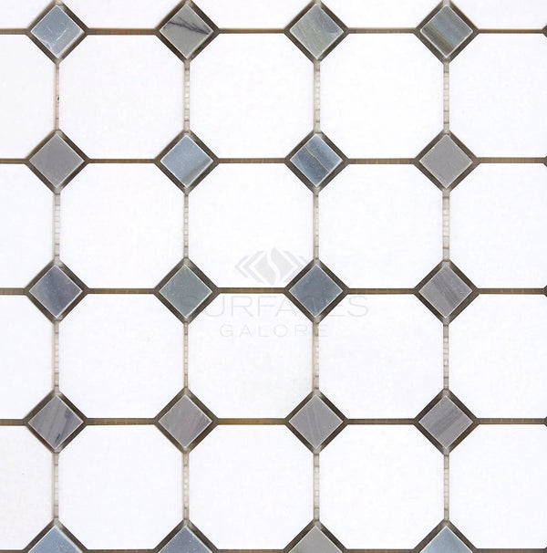 A SurfacesGalore Thassos White (Greek) Octagon (w/ Blue-Gray) Mosaic Marble Polished-Honed pattern with octagonal white marble pieces and blue-gray diamond shapes connected by brown lines, showcasing a crystalline texture.