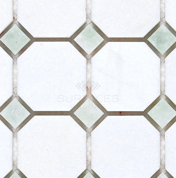 The Thassos White (Greek) Octagon (w/ Ming-Green) Mosaic Marble Polished-Honed tile from SurfacesGalore offers a luxurious look reminiscent of Thassos White Marble, with a white geometric tile pattern accented by light green diamonds, perfect for elevating any space.