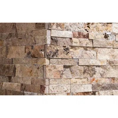 Close-up of a corner wall constructed with Valencia Travertine Ledger-Panel ("Z" Split-Panel) - CORNER Mosaic Split-Faced bricks in beige and brown, highlighting the rough texture and premium quality associated with SurfacesGalore.