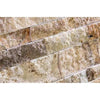 Close-up of a textured stone wall showcasing the Valencia Travertine Ledger-Panel ("Z" Split-Panel) Mosaic Split-Faced from SurfacesGalore, with various shades of beige, brown, and tan, featuring uneven surfaces and lines characteristic of premium travertine.