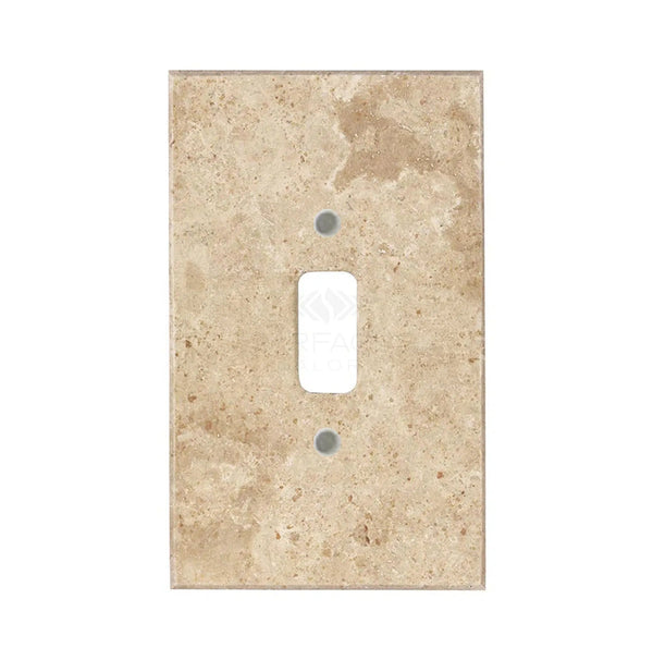 A walnut travertine single toggle plate switch cover from SurfacesGalore, featuring a rectangular opening and showcasing natural stone variations. This authentic marble wall plate adds an elegant touch to any room.