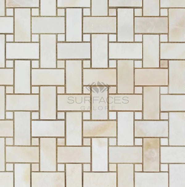 Cream and beige geometric tile pattern with interlocking brick design, featuring premium quality White Onyx (Bianco-Vanilla) basketweave mosaic with White Onyx dots (cross-cut) marble accents, and the text "SurfacesGalore" in the center.