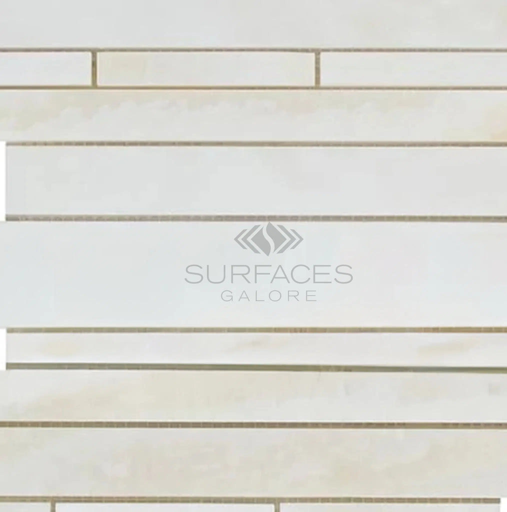 Light beige and white tiled surface with the logo "SurfacesGalore" at the center, featuring premium quality White Onyx (Bianco-Vanilla) Random-Strip (Manhattan) (Cross-cut) Premium Mosaic Marble Tile Polished.