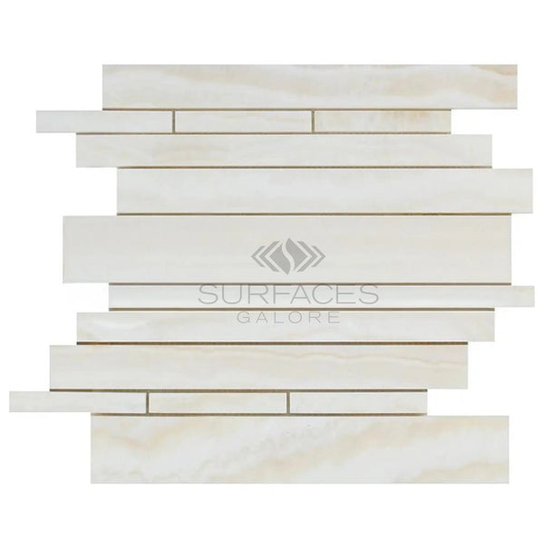 A sample of the White Onyx (Bianco-Vanilla) Random-Strip (Manhattan) (Vein-cut) Premium Mosaic Marble Tile Polished from SurfacesGalore, in light beige and cream-colored staggered rectangles, perfect for luxurious and backlit applications.