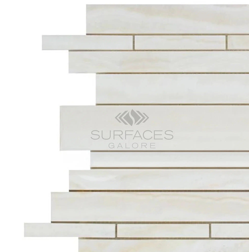 Rectangular tiles of White Onyx (Bianco-Vanilla) Random-Strip (Manhattan) Premium Mosaic Marble, polished and vein-cut, varying in size and arranged in a staggered pattern, with "SurfacesGalore" illuminated at the center.