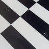 Black and white checkered pattern in Arezzo in Bianco Dolomite and Nero Marquina 4X12 Set