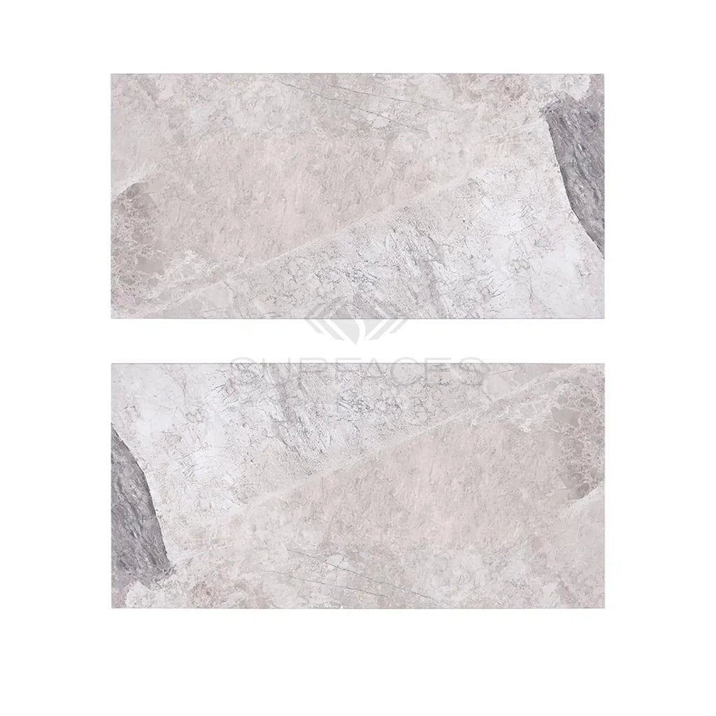 Two Atlantic Gray Marble 3X6 Polished or Honed tiles with a marble pattern