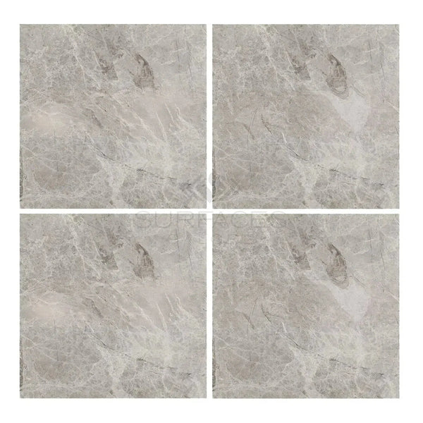 Four Atlantic Gray Marble 4X4 Polished or Honed tiles displayed elegantly