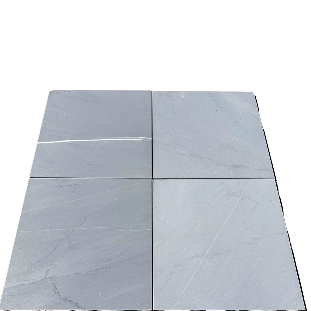 Four gray Bardiglio Imperiale 12X12 polished or honed marble tiles displayed