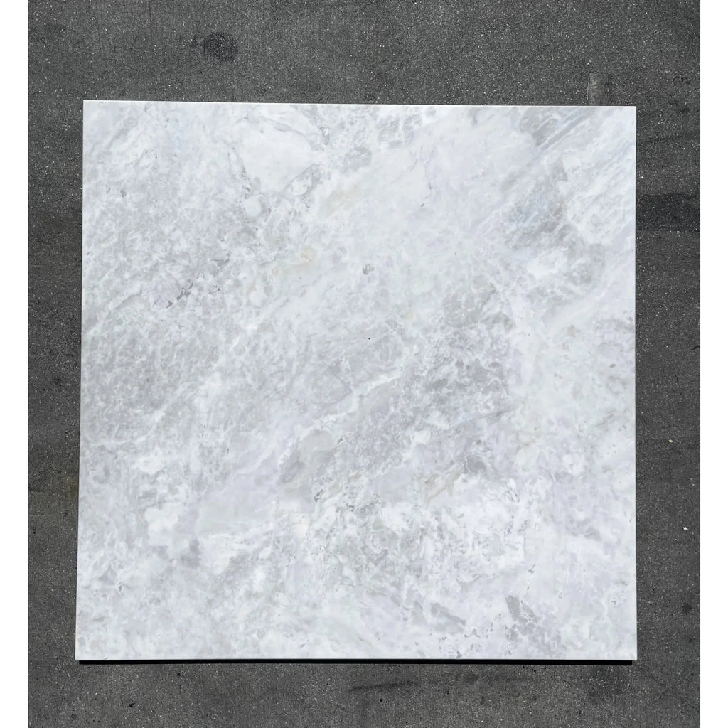 Square marble tile of Bianco Congelato 1/2X12 Pencil Liner Dolomite Leathered