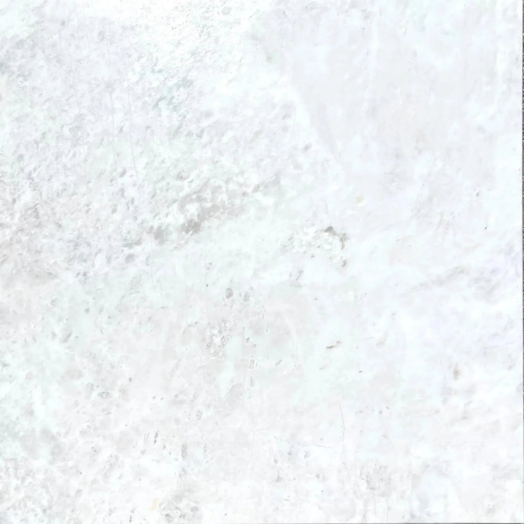 White marble texture in Bianco Congelato 1X2 Herringbone Mosaic Dolomite Leathered