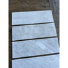 Rectangular marble tiles of Bianco Congelato 1X4 Herringbone Mosaic Dolomite Leathered