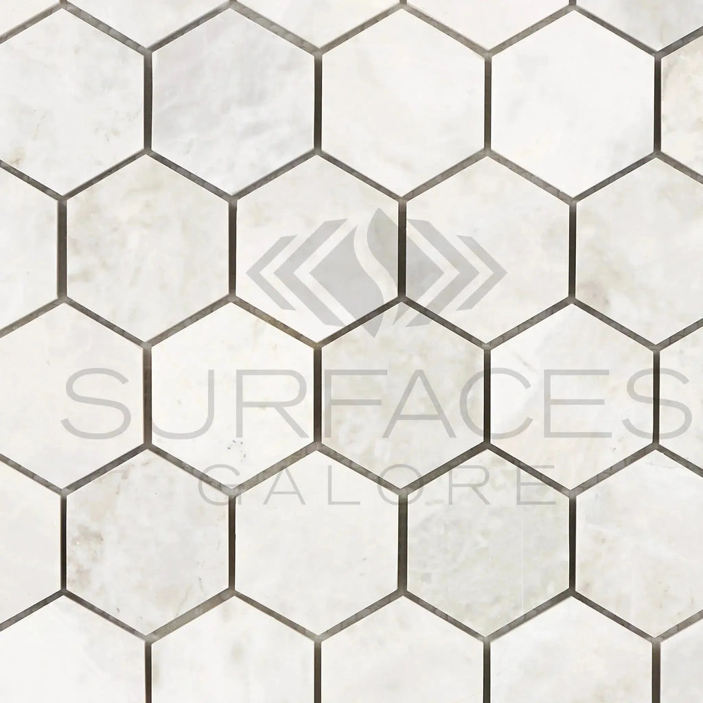 White hexagon tile pattern of Bianco Congelato 2 inch Hexagon Mosaic Dolomite Leathered