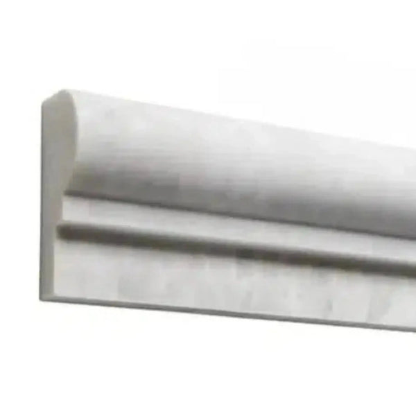 White marble trim in Bianco Congelato 2X12 OG-1 Single-Step Chair Rail Trim Dolomite Leathered