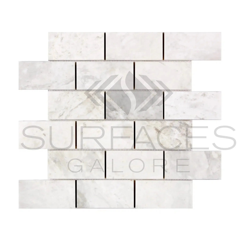 White marble brick mosaic tile in Bianco Congelato 2x4 Dolomite Leathered design