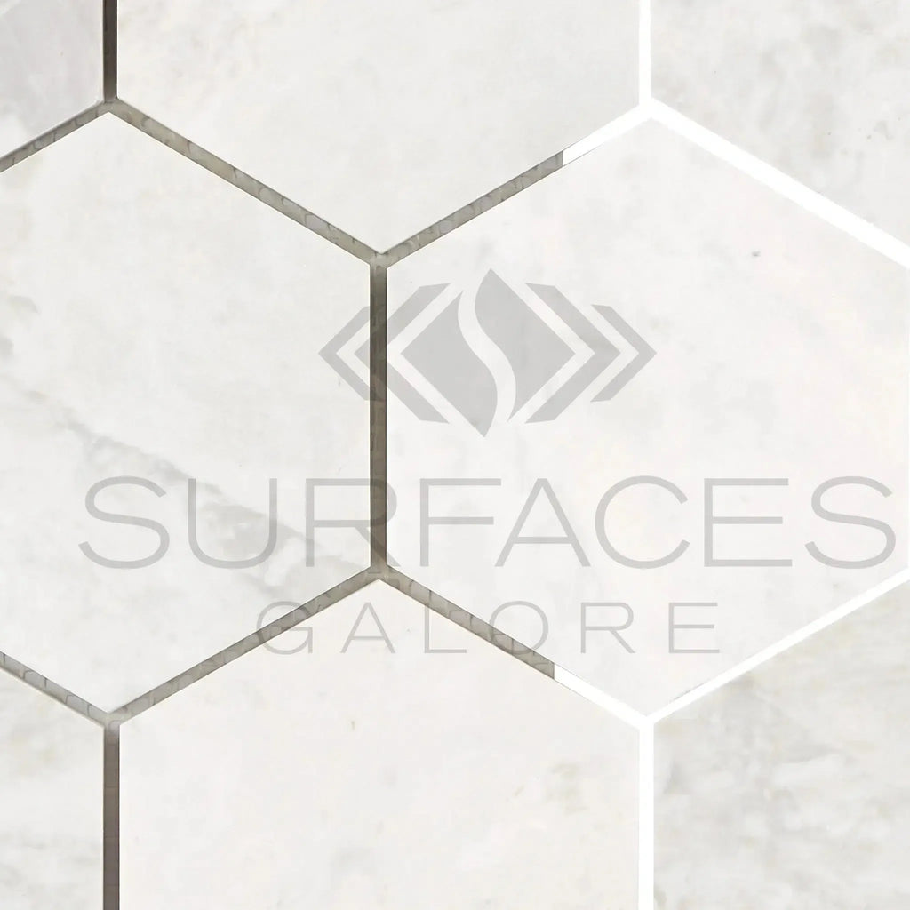 White marble hexagon tiles in Bianco Congelato 4 inch Mosaic Dolomite Leathered design