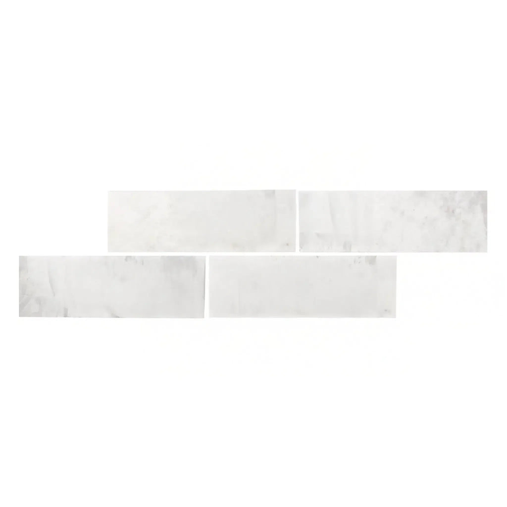 Rectangular white marble tiles of Bianco Congelato 4X12 Dolomite Leathered finish