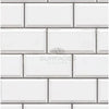 White beveled subway tile in Bianco Dolomite 2X4 brick polished-honed mosaic