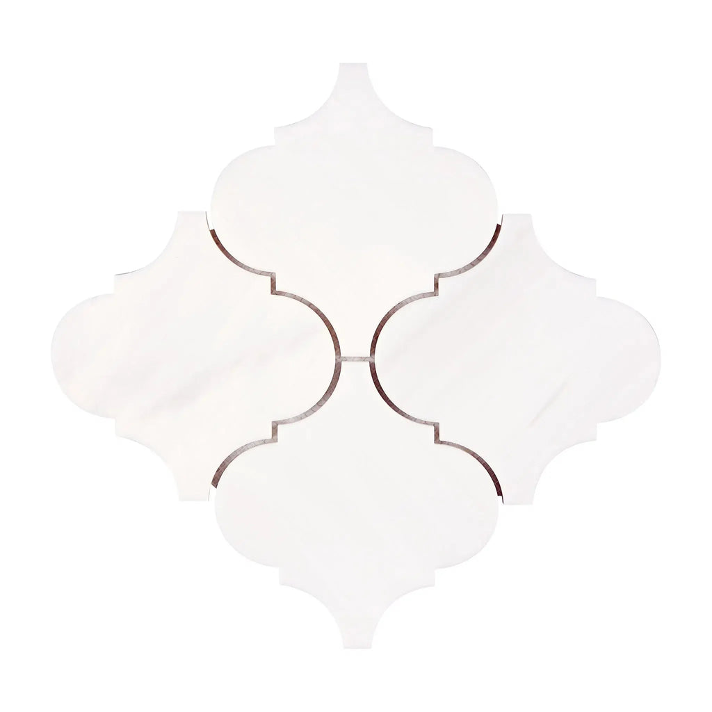 White quatrefoil tile arrangement featuring Bianco Dolomite 6-inch lantern mosaic