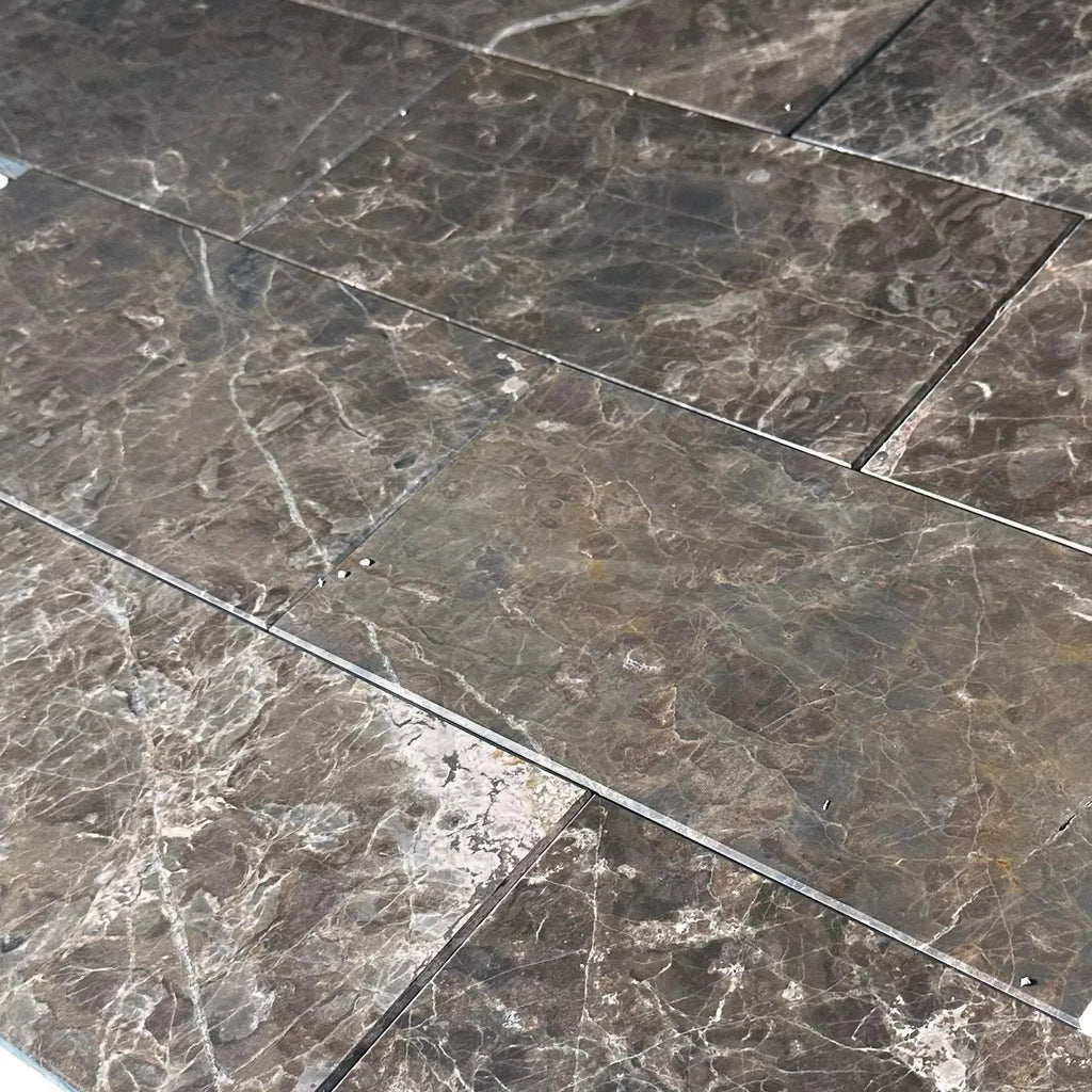 Brown marble floor tiles showcased in Cafe Emperador 6X12 Polished Tile clearance sale