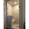 Modern marble shower enclosure featuring Calacatta Gold Pencil Liner in polished finish