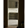 Gray kitchen cabinets complement Calacatta Gold 1X1 Mosaic Marble Tile