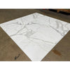 Square marble tile showcasing Calacatta Gold Manhattan polished mosaic design