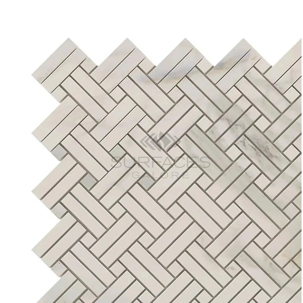 Herringbone pattern of Calacatta Gold Stanza Mosaic Marble Tile in polished finish