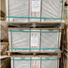 Stacked pallets of Carrara White 1 inch Hexagon Mosaic Marble Tile polished or honed