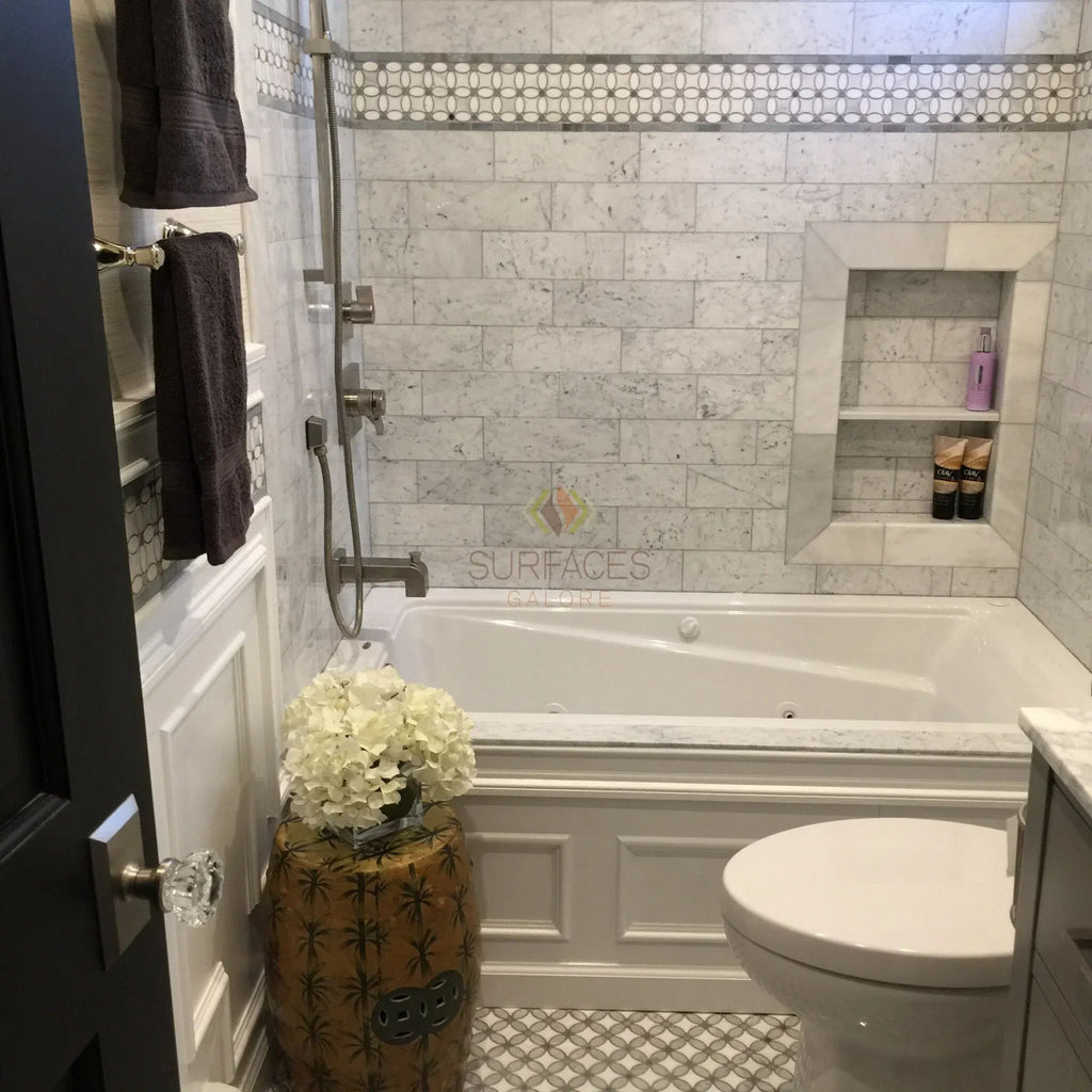 Elegant bathroom featuring Carrara White Basketweave Mosaic Marble Tile with Black accents