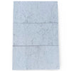 Three Carrara White Berlinatta Design marble tiles with blue-gray accents