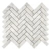 White marble tabletop featuring Carrara White Herringbone Mosaic Tile design