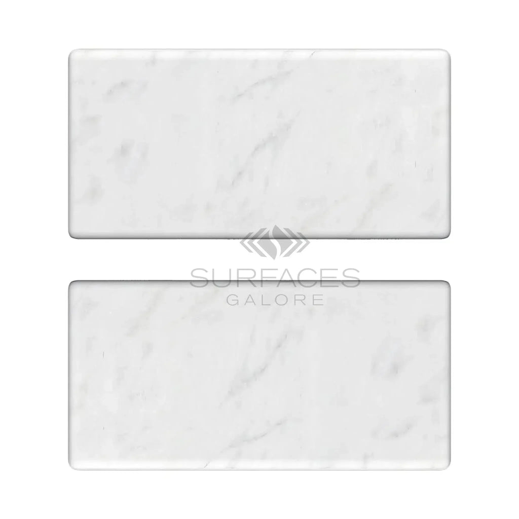 Two white marble rectangles of Carrara White Marble 3X6 Tumbled