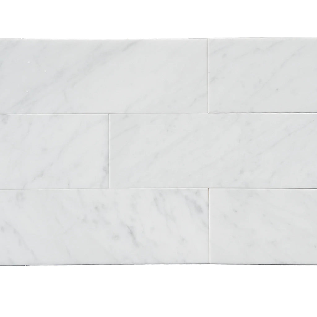 Carrara White Marble 4X12 Polished or Honed Subway Tile displayed on a surface