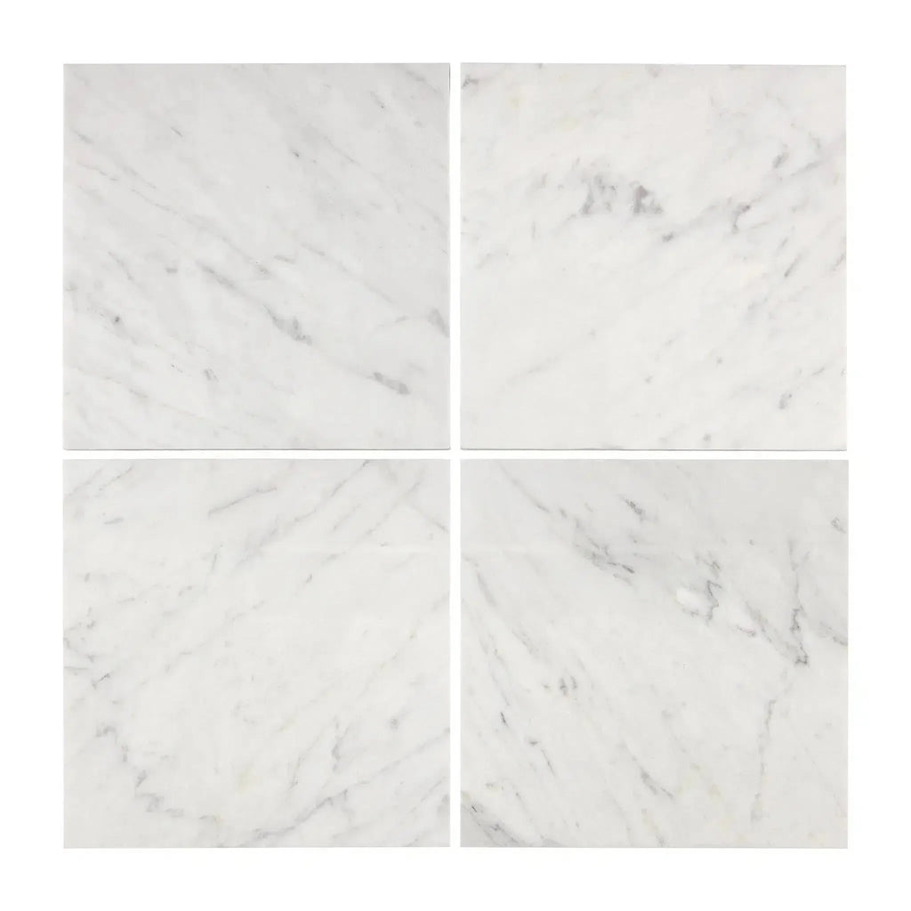 Four white marble tiles from Carrara White Marble 6X6 Polished or Honed collection