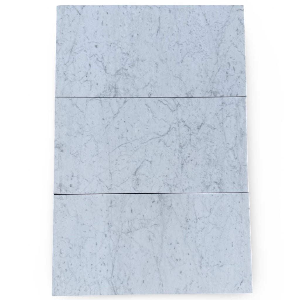 Three elegant marble tiles featuring Carrara White and Rojo Alicante design
