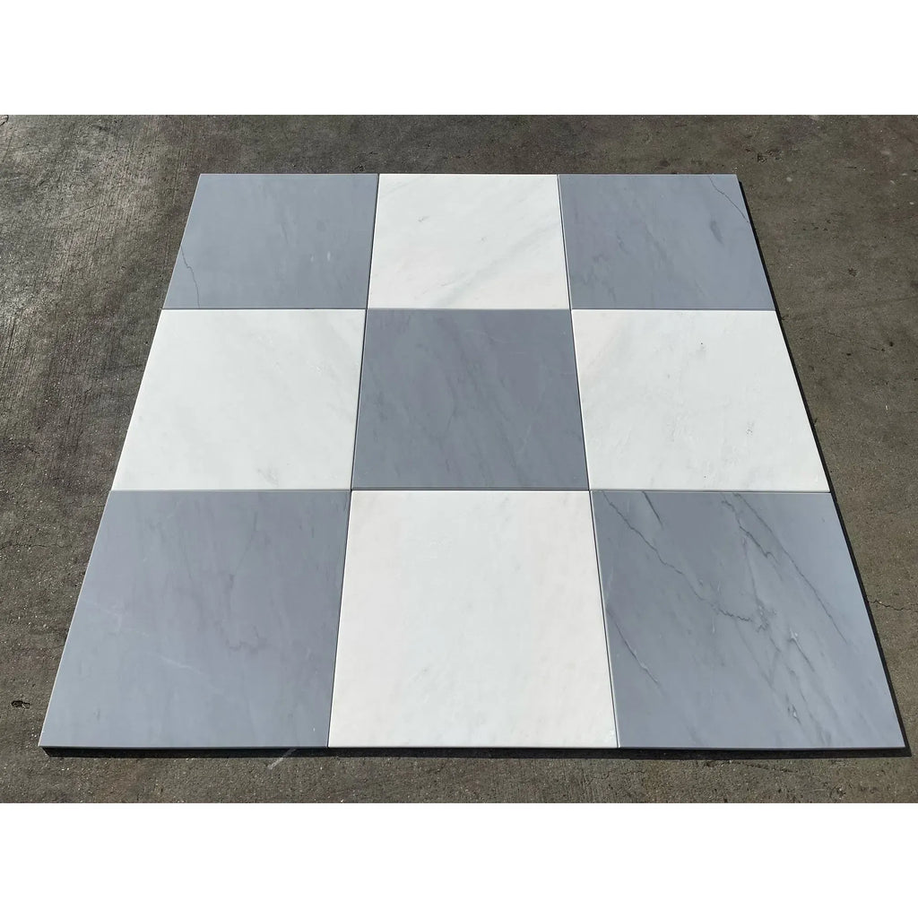 Checkerboard pattern of Bardiglio Imperiale and Oriental White marble tiles