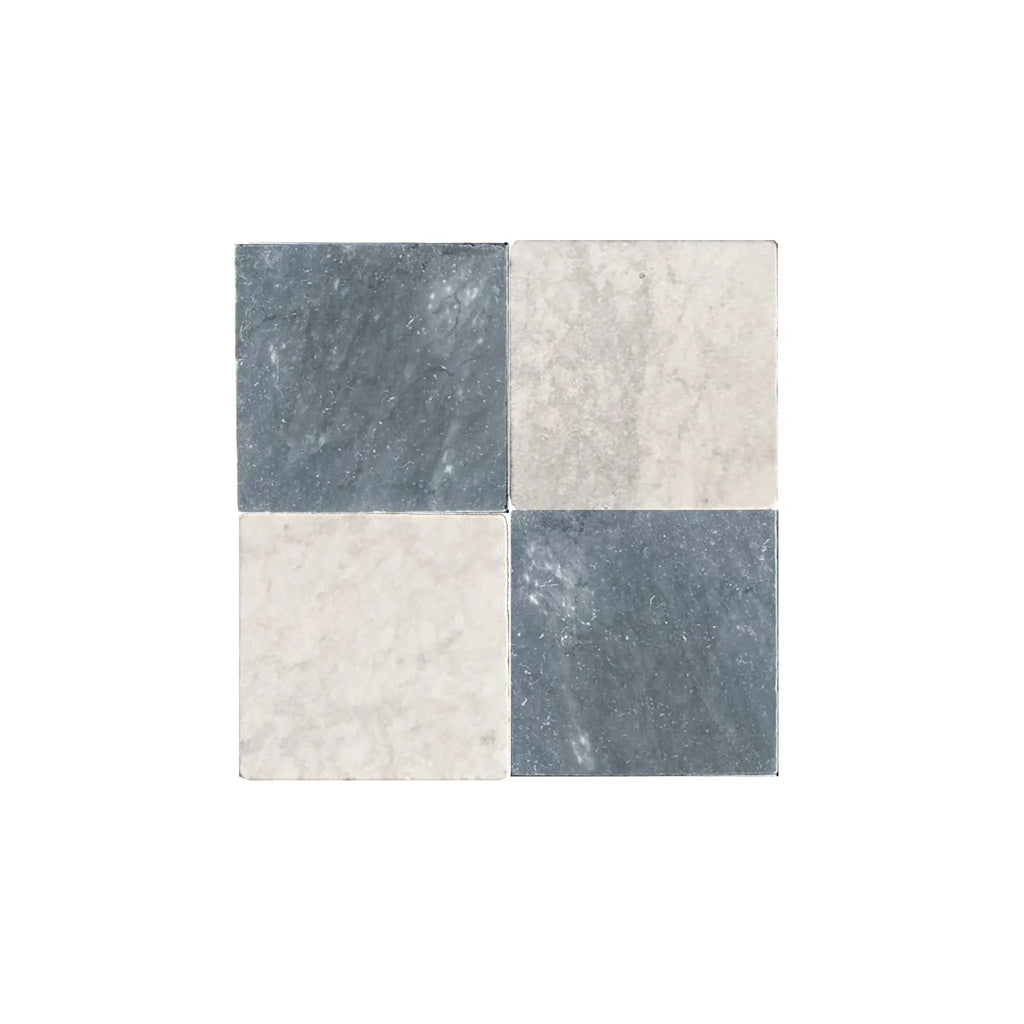 Four square marble tiles in a checkerboard pattern featuring Bardiglio and Carrara White