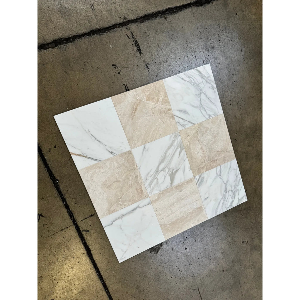 Square tile featuring alternating Calacatta Gold and Diano Royal marble squares