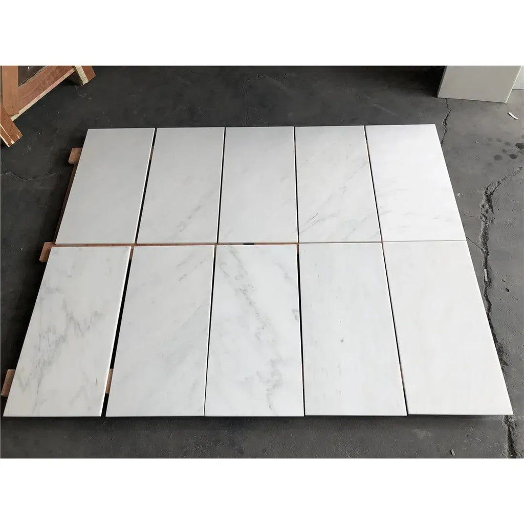 Rectangular white marble tiles in Checkerboard Carrara White and Oriental White set