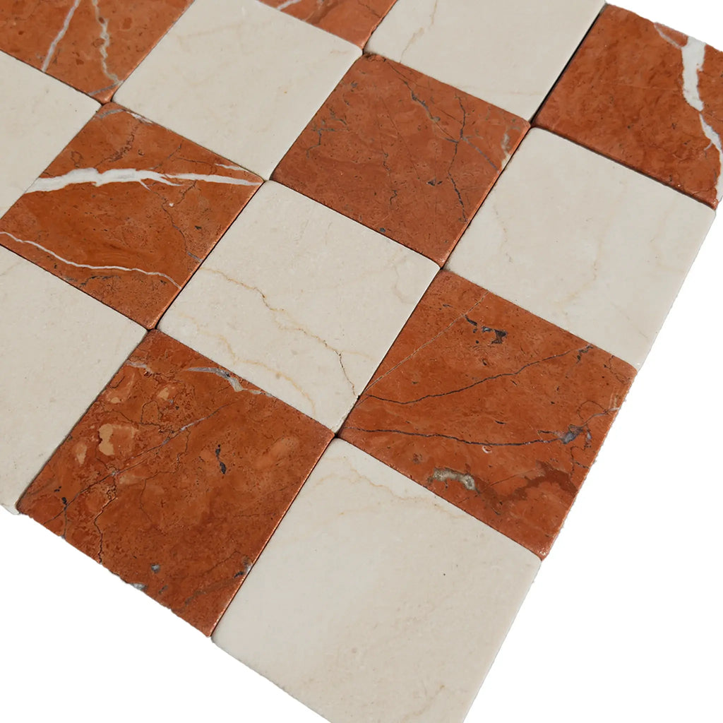 Checkerboard pattern of Crema Marfil and Rojo Alicante marble tiles in 3X3 tumbled design